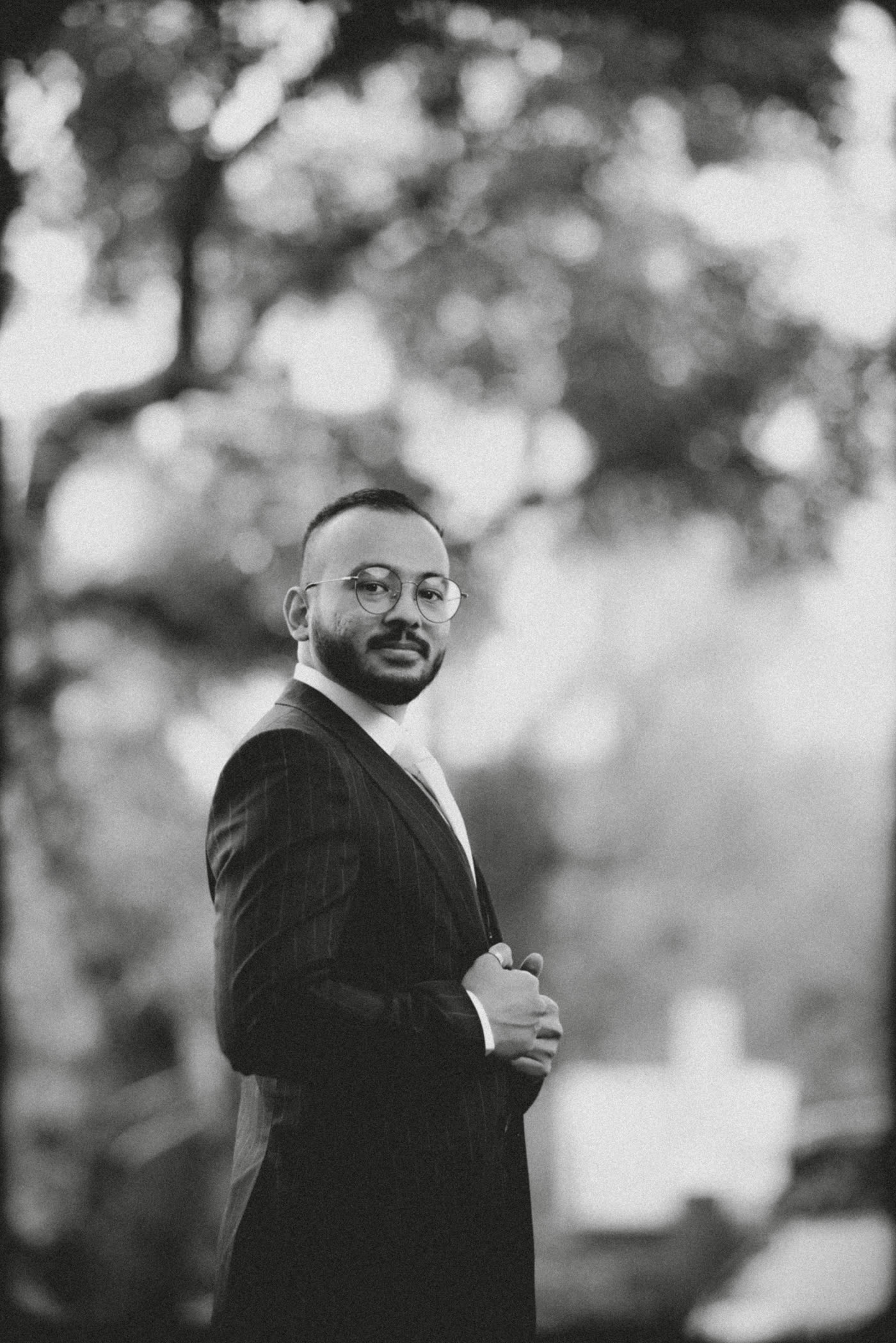 A groom's portrait in black and white